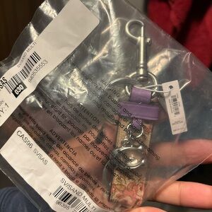 Coach Purple Leather and Floral Keychain with Silver Clip And C Charm